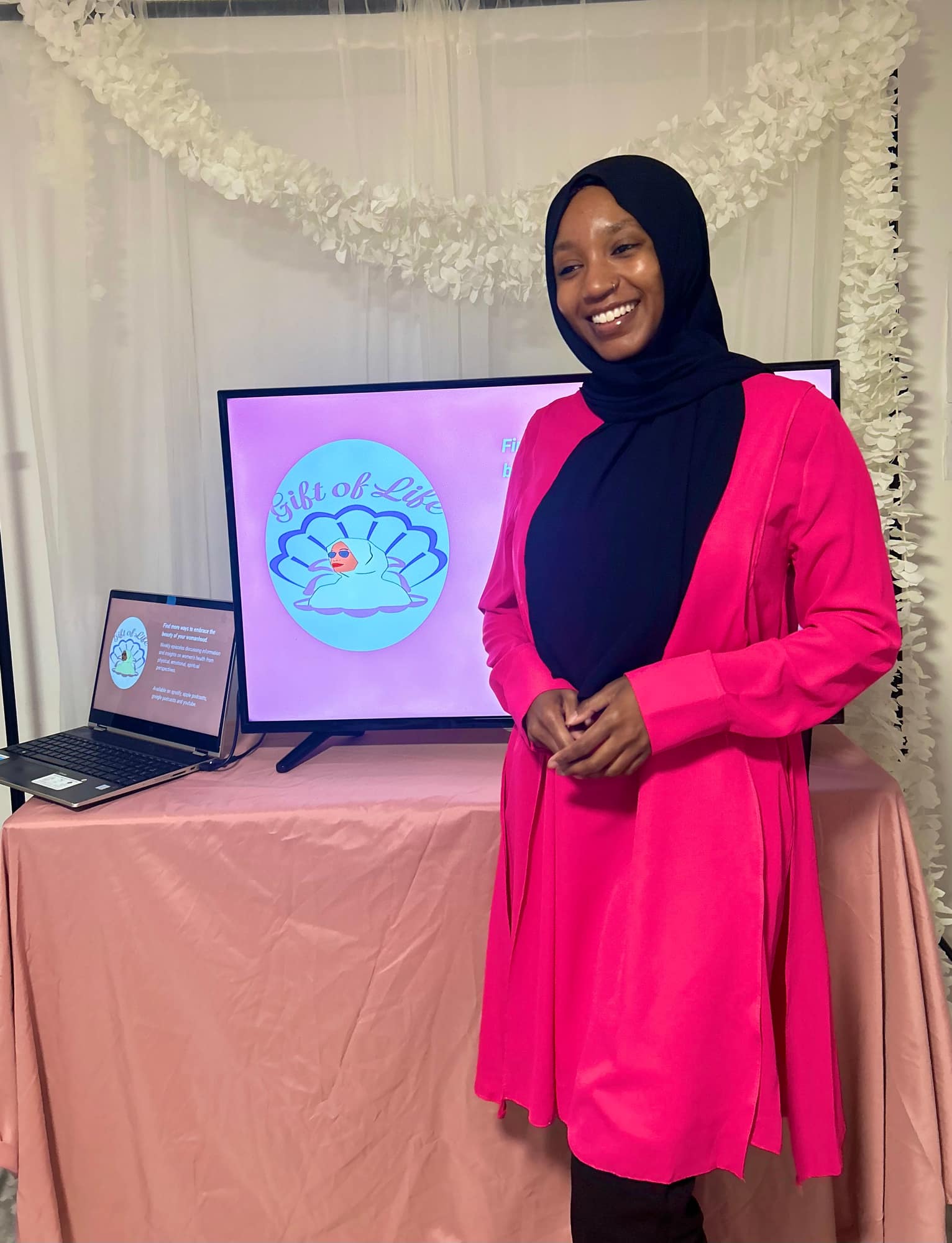 Speaker standing beside the Gift of Life slide at a Teen Talk session